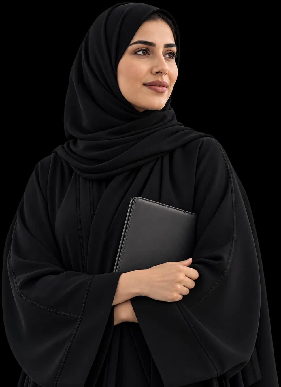 Emirati graduate in an abaya holding a portfolio
